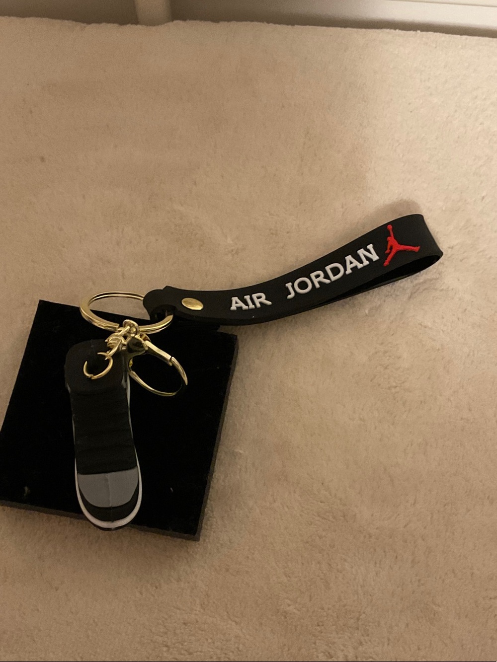 Jordan Black Key Fob with Red Jumpman and Gold Hardware